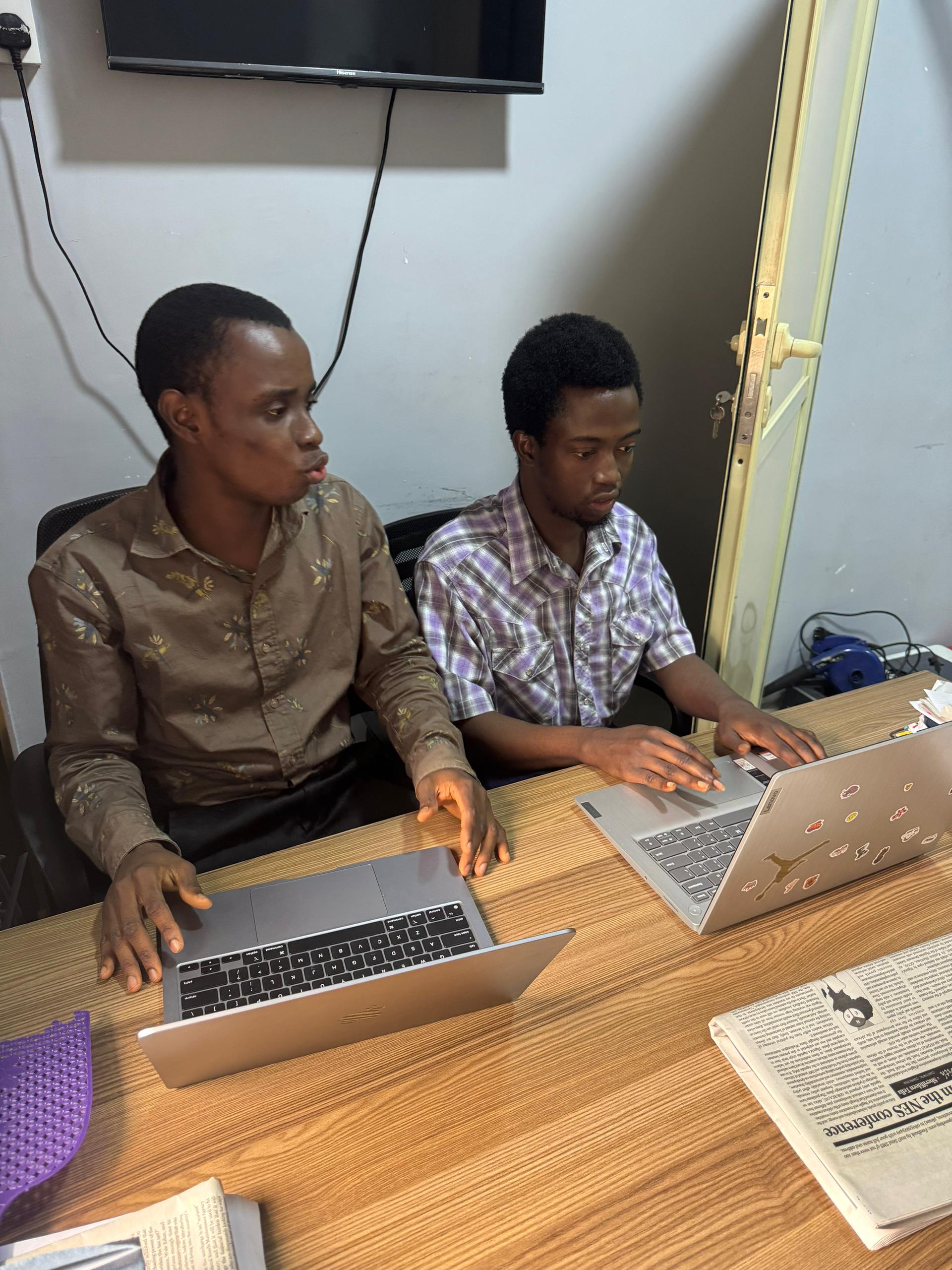 Moshood collaborating on code